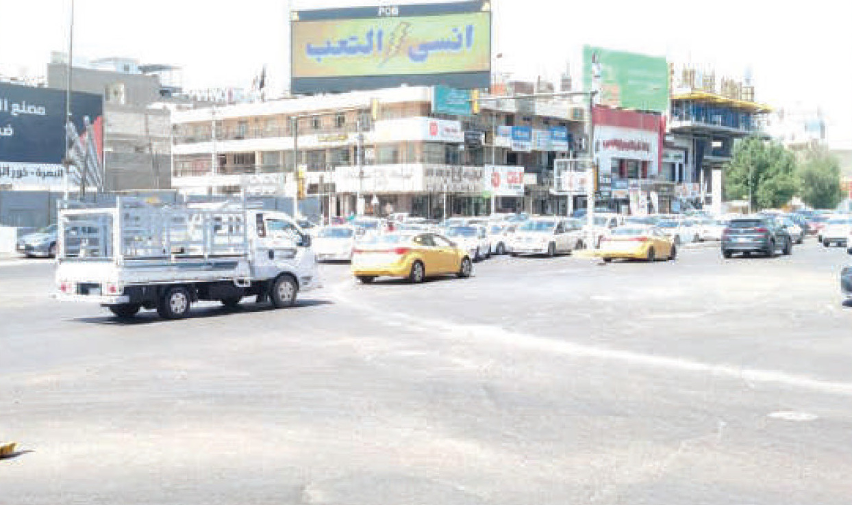 Rooftop billboard over a busy intersection - 'Forget Fatigue' out-of-home placement